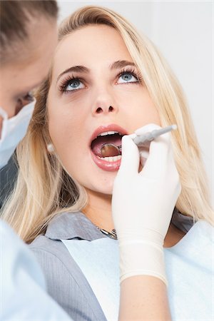 female dentist - Young Woman getting Check-up at Dentist's Office, Germany Stock Photo - Premium Royalty-Free, Code: 600-06438881