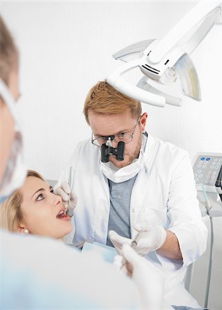 dentist - Young Woman getting Check-up at Dentist's Office, Germany Stock Photo - Premium Royalty-Free, Code: 600-06438898