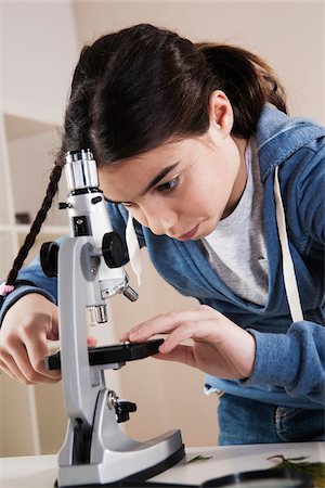 simsearch:600-06548614,k - Girl using Microscope, Mannheim, Baden-Wurttemberg, Germany Stock Photo - Premium Royalty-Free, Code: 600-06486447