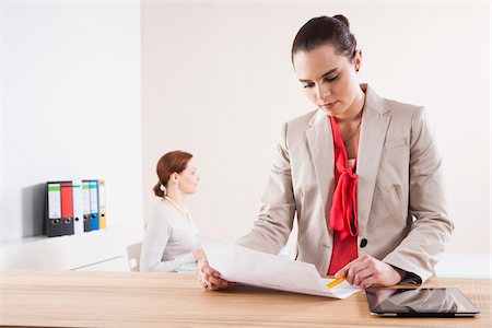 simsearch:600-06355235,k - Women Working in Office Stock Photo - Premium Royalty-Free, Code: 600-06645509