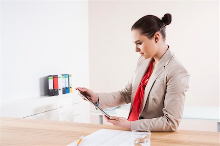 Young Woman Working in Office Stock Photo - Premium Royalty-Free, Code: 600-06645515