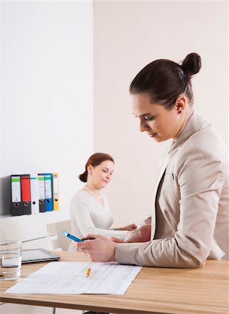 simsearch:600-06355235,k - Women Working in Office Stock Photo - Premium Royalty-Free, Code: 600-06645518