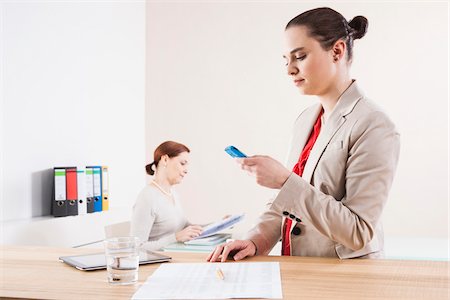simsearch:600-06355235,k - Women Working in Office Stock Photo - Premium Royalty-Free, Code: 600-06645519