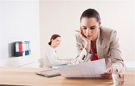 simsearch:600-06355235,k - Women Working in Office Stock Photo - Premium Royalty-Free, Code: 600-06645513