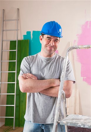 step ladder - Mature Man Renovating Home Stock Photo - Premium Royalty-Free, Code: 600-06679384