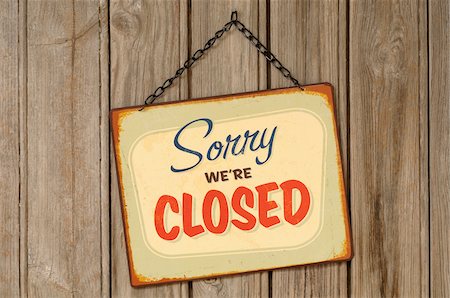 Closed Sign Hanging on Wall Stock Photo - Premium Royalty-Free, Code: 600-06702114