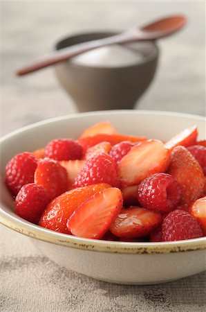 simsearch:600-05973291,k - Close-up of Bowl of Strawberries and Raspberries with Bowl of Sugar in Background, Studio Shot Stock Photo - Premium Royalty-Free, Code: 600-06752243