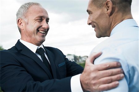 Close-up of businessmen talking Foto de stock - Sin royalties Premium, Código: 600-06782206