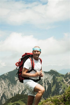 simsearch:632-05604251,k - Portrait of mature man hiking in mountains, Tannheim Valley, Austria Photographie de stock - Premium Libres de Droits, Code: 600-06826390