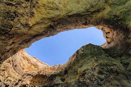 Natural Arch in Cliffs between Armacao de Pera and Portimao, Benagil, Lagoa, Portugal Stock Photo - Premium Royalty-Free, Code: 600-06841865