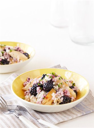 Warm Chicken and Barley Salad with Blackberries, Studio Shot Stock Photo - Premium Royalty-Free, Code: 600-06934986
