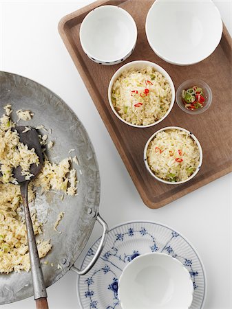 simsearch:600-05973291,k - Overhead View of Cooked Rice in Bowls by Wok, Studio Shot Stock Photo - Premium Royalty-Free, Code: 600-06963790