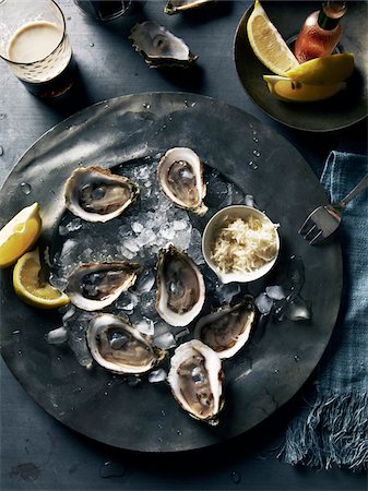 drink - Overhead View of Plate of Oysters, Studio Shot Stock Photo - Premium Royalty-Free, Code: 600-07110424