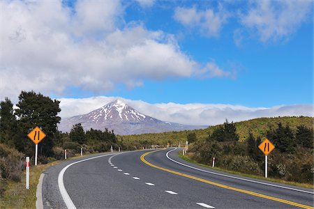 direction sign and nobody road - State Highway Road, Mount Tongariro, Tongariro National Park, Waikato, North Island, New Zealand Stock Photo - Premium Royalty-Free, Code: 600-07110717