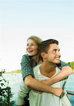 Young Man giving Young Woman Piggyback Ride, Mannheim, Baden-Wurttermberg, Germany Foto de stock - Sin royalties Premium, Código: 600-07110812