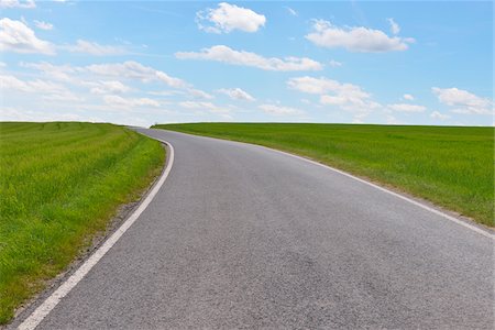 roadways in the sky - Country Road in Spring, Altertheim, Bavaria, Germany Stock Photo - Premium Royalty-Free, Code: 600-07156447