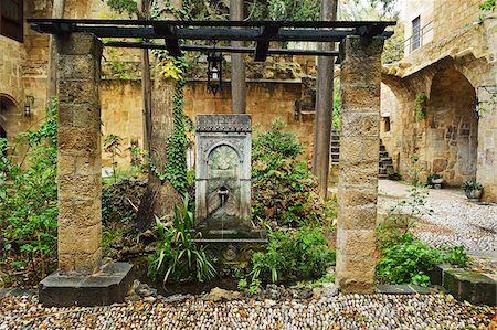 stone archways exterior - Scene from the Old Town, Rhodes City, Rhodes, Dodecanese, Aegean Sea, Greece, Europe Stock Photo - Premium Royalty-Free, Code: 600-07199961