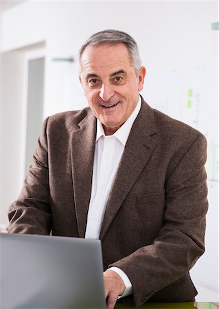 simsearch:600-06939769,k - Businessman in Office, Mannheim, Baden-Wurttemberg, Germany Stock Photo - Premium Royalty-Free, Code: 600-07192182