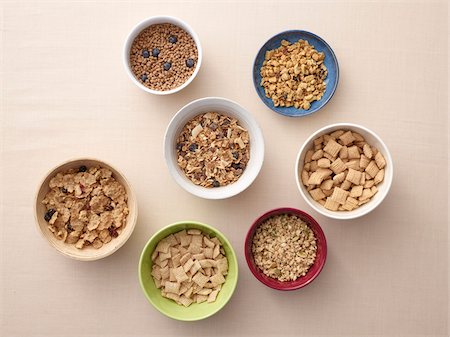 fiber (nutrition) - Overhead view of bowls of a variety of healthy cereals, studio shot Stock Photo - Premium Royalty-Free, Code: 600-07203968