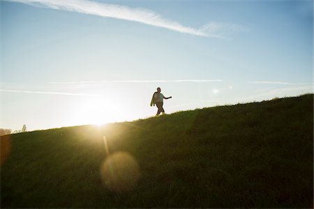 people walking in the distance - Senior Man Walking Outdoors, Baden-Wurttemberg, Germany Stock Photo - Premium Royalty-Free, Code: 600-07236624