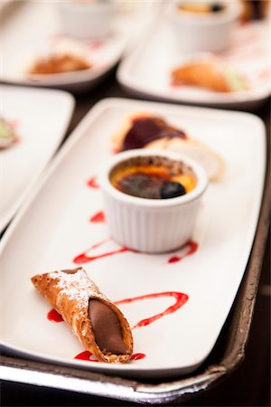 serving gourmet food - Chocolate Cannoli and Creme Brulee for Dessert at Wedding Stock Photo - Premium Royalty-Free, Code: 600-07237822