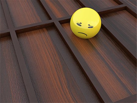 3D Illustration of Yellow Glass Marble with Sad Face Stock Photo - Premium Royalty-Free, Code: 600-07279369