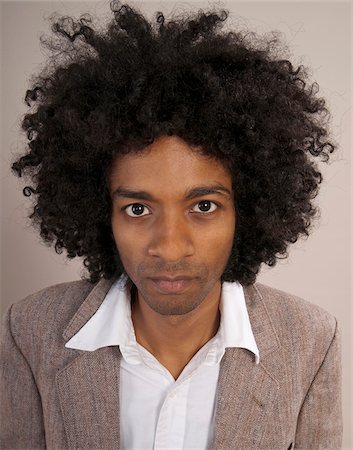 Portrait of Young Man, Studio Shot Foto de stock - Sin royalties Premium, Código: 600-07351328
