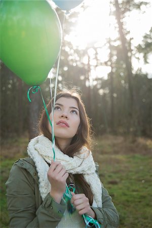 simsearch:600-03768639,k - Young Woman with Balloons Outdoors, Mannheim, Baden-Wurttemberg, Germany Stock Photo - Premium Royalty-Free, Code: 600-07368564