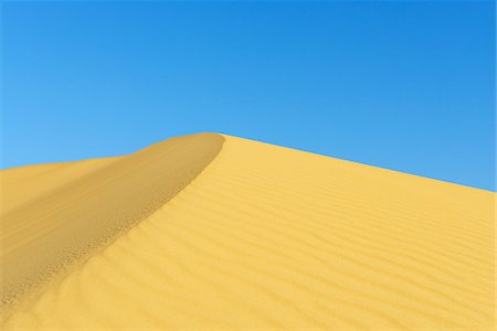 sands and desert and nobody and landscape - Top of Sand Dune against Blue Sky, Matruh, Great Sand Sea, Libyan Desert, Sahara Desert, Egypt, North Africa, Africa Stock Photo - Premium Royalty-Free, Code: 600-07431217