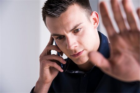 simsearch:600-07110828,k - Young Man Working in Office, Mannheim, Baden, Wurttemberg, Germany Stock Photo - Premium Royalty-Free, Code: 600-07431256