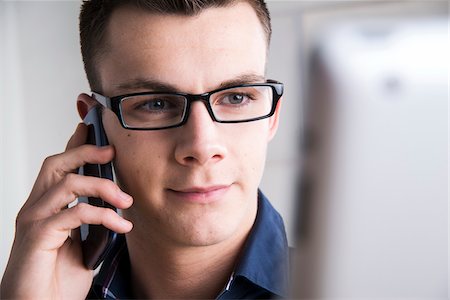 simsearch:600-07110828,k - Young Man Working in Office, Mannheim, Baden, Wurttemberg, Germany Stock Photo - Premium Royalty-Free, Code: 600-07431261