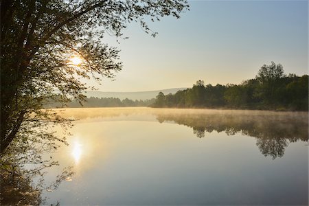 scenery with calm waters - Lake at Sunrise in the Spring, Mondfeld, Mainfranken, Franconia, Baden Wurttemberg, Germany Stock Photo - Premium Royalty-Free, Code: 600-07599948