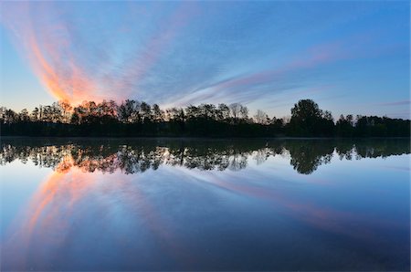 Clouds Reflected in River at Sunrise, River Main, Obernburg, Untermain, Spessart, Franconia, Bavaria, Germany Stock Photo - Premium Royalty-Free, Code: 600-07591275
