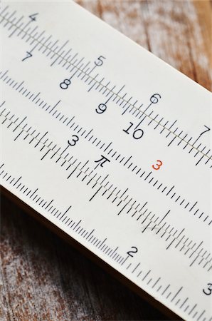 Close-up of Old Wooden Slide Rule Stock Photo - Premium Royalty-Free, Code: 600-07637017