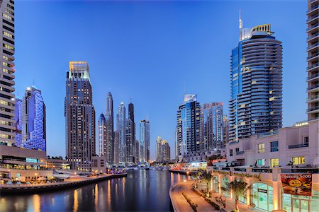 dubai - Skyscrapers at Dubai Marina illuminated at Dusk. Dubai, United Arab Emirates Stock Photo - Premium Royalty-Free, Code: 600-07653876