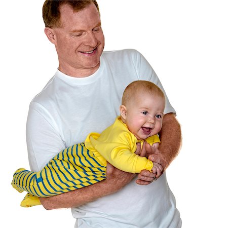 simsearch:700-06758135,k - Portrait of Father Holding Baby Boy, Studio Shot Stock Photo - Premium Royalty-Free, Code: 600-07784455