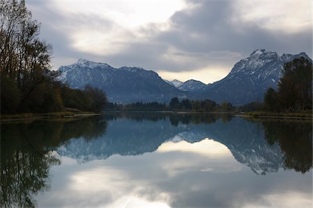 simsearch:400-05668316,k - Scenic of Lake with Mountain Range in Autumn, Lake Forggensee, Fuessen, Bavaria, Germany Stock Photo - Premium Royalty-Free, Code: 600-07844556