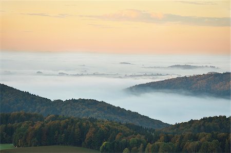 pictures of natures sunrise in hill - Scenic overview of hills on an early, autumn morning with fog, Bavarian Forest National Park, Bavaria, Germany Stock Photo - Premium Royalty-Free, Code: 600-07911268