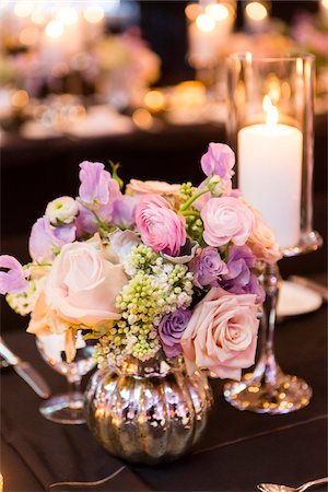 purple floral arrangement - Flower Arrnagement and Candle at Wedding Reception Stock Photo - Premium Royalty-Free, Code: 600-07991476