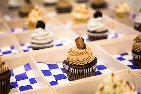 simsearch:600-07067653,k - Close-up of Chocolate Cupcakes in Individual Boxes at Bar Mitzvah Stock Photo - Premium Royalty-Free, Code: 600-07991481