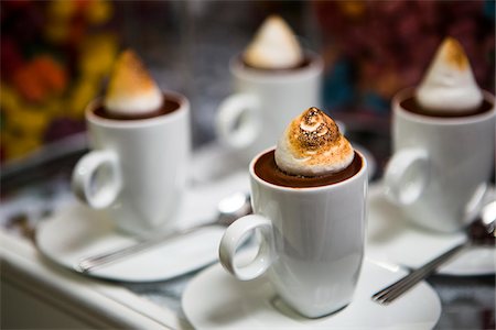 simsearch:600-07067653,k - Mugs of Chocolate Mousse with Meringue on Dessert Table Stock Photo - Premium Royalty-Free, Code: 600-07991668