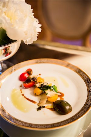 plated food - Close-up of Salad with Heirloom Tomatoes, Pecorino Cheese and Balsamic Vinegar at Wedding Reception Stock Photo - Premium Royalty-Free, Code: 600-07991671