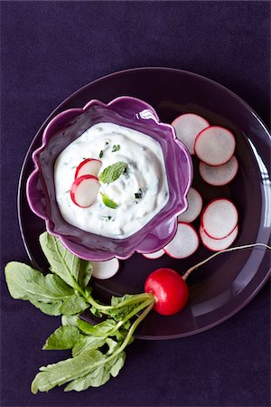 simsearch:600-07311268,k - Purple plate with raddish slices and mint dip, studio shot on purple background Stock Photo - Premium Royalty-Free, Code: 600-08002117