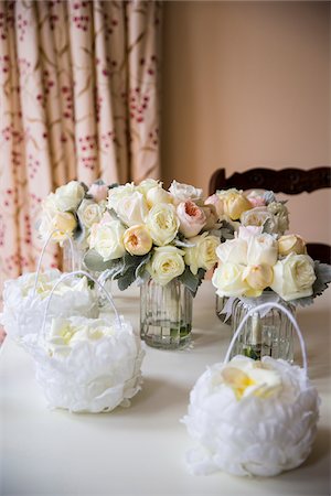 simsearch:600-07451036,k - Small baskets of rose petals and bridal bouquets in vases on table, Wedding Day preparations, Canada Stock Photo - Premium Royalty-Free, Code: 600-08002545