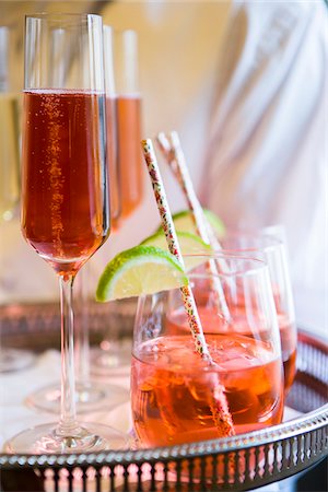 Close-up of Pink Champagne and Cocktail on Serving Tray Stock Photo - Premium Royalty-Free, Code: 600-08025965