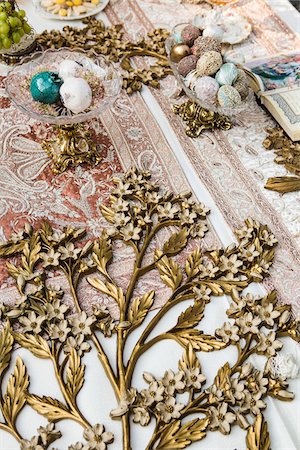 Koran, Eggs and Floral Decorations on Sofre-ye-Aghd for Persian Wedding Ceremony Stock Photo - Premium Royalty-Free, Code: 600-08059981