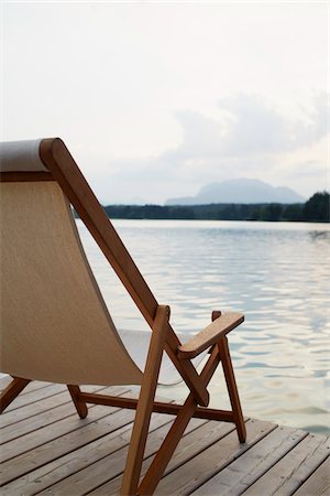 Deck Chair on Dock, Faaker See, Carinthia, Austria Stock Photo - Premium Royalty-Free, Code: 600-08138897