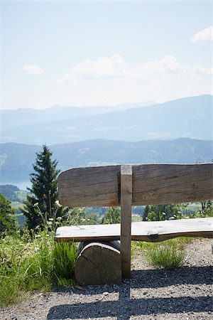 Bench overlooking Lake and Mountains, Carinthia, Austria Stock Photo - Premium Royalty-Free, Code: 600-08145738