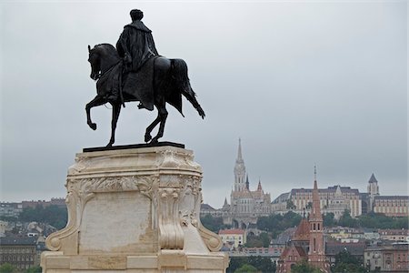 Equestrian Statue with Matthias Church in the Background, Budapest, Hungary Stock Photo - Premium Royalty-Free, Code: 600-08212948
