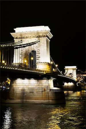 Arches of Szechenyi Chain Bridge Illuminated at Night, Budapest, Hungary Stock Photo - Premium Royalty-Free, Code: 600-08212962